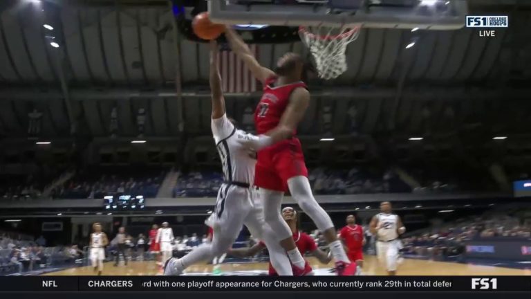 Saginaw Valley’s Toodles Seal delivers a monstrous block against Butler’s Posh Alexander