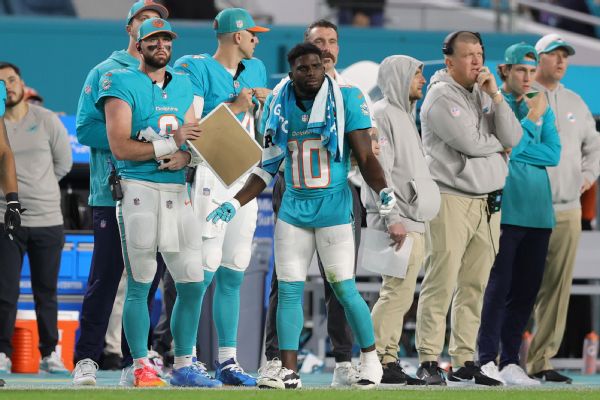 Injured Hill plays on, spurred in part by wife’s text