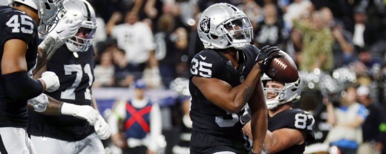 Raiders hang team-record 63 on banged-up Bolts